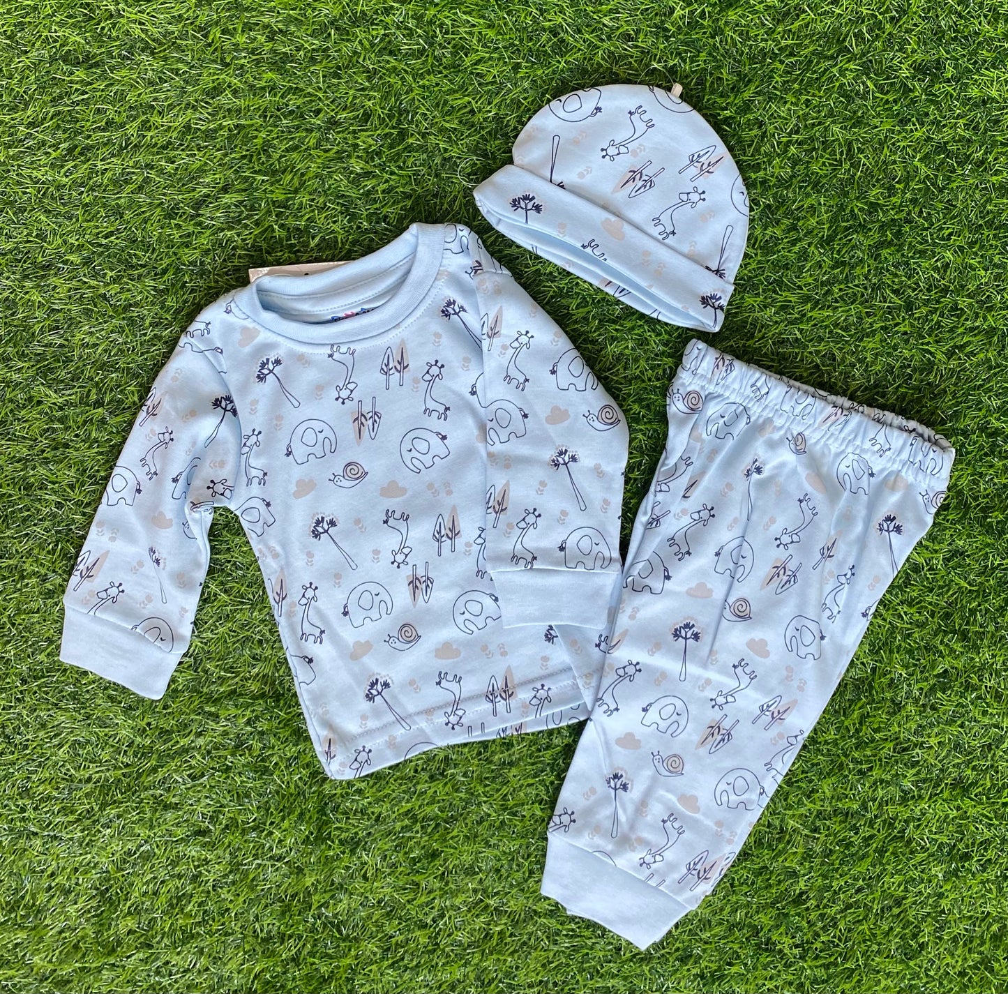 "Blue baby Pajama 0-3 moths- featuring a printed top, pants, and matching hat"