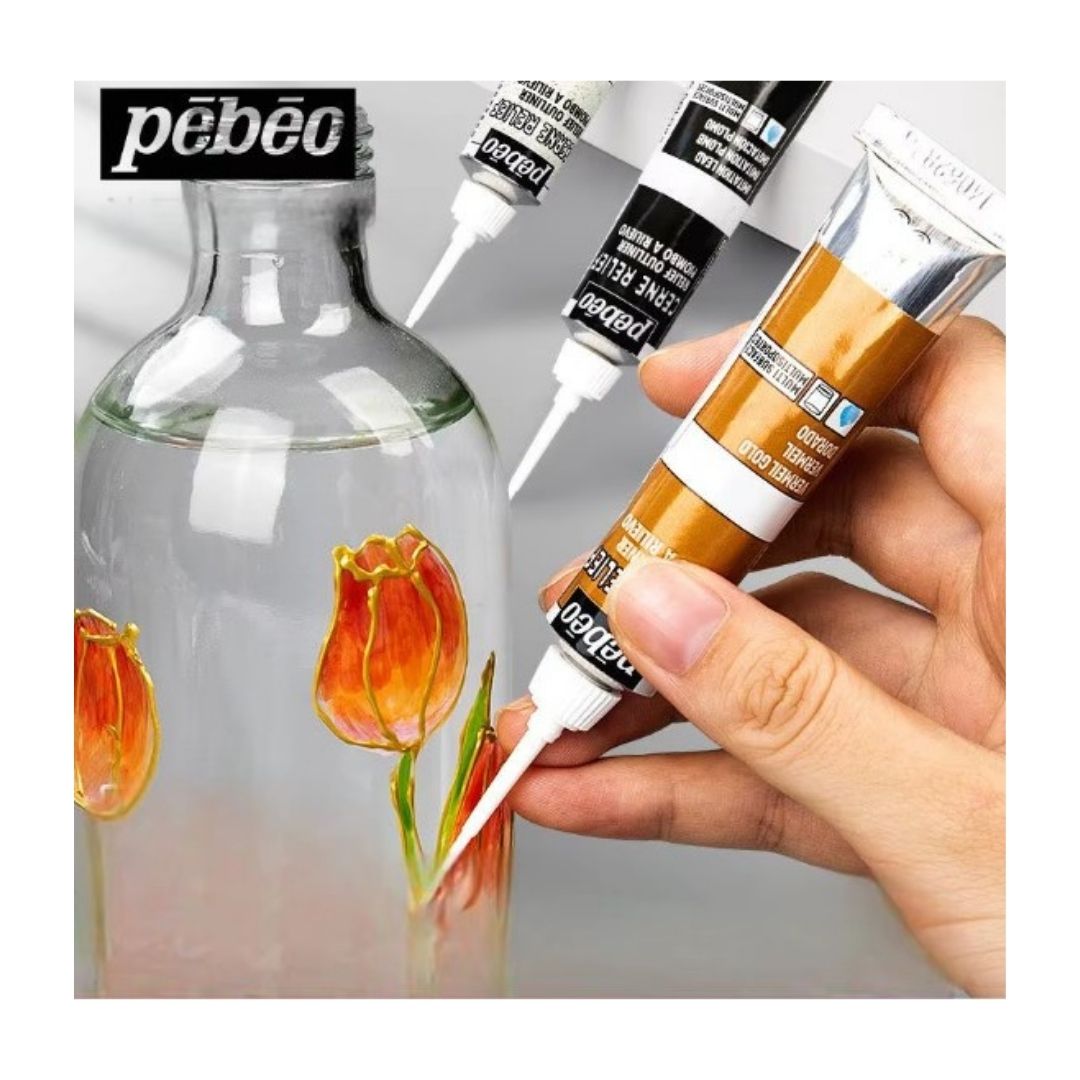 "Outliner paint creating raised decorative floral design on surface"