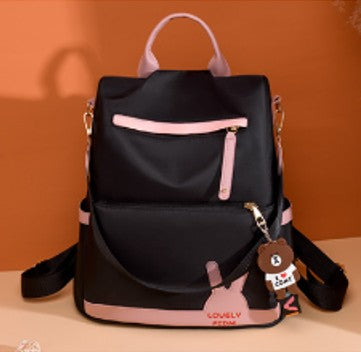 "Stylish black and pink backpack carried as a handbag or Backpack"